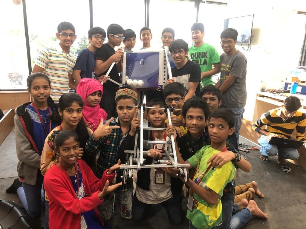 Dharavi Dynamites team with competition robot